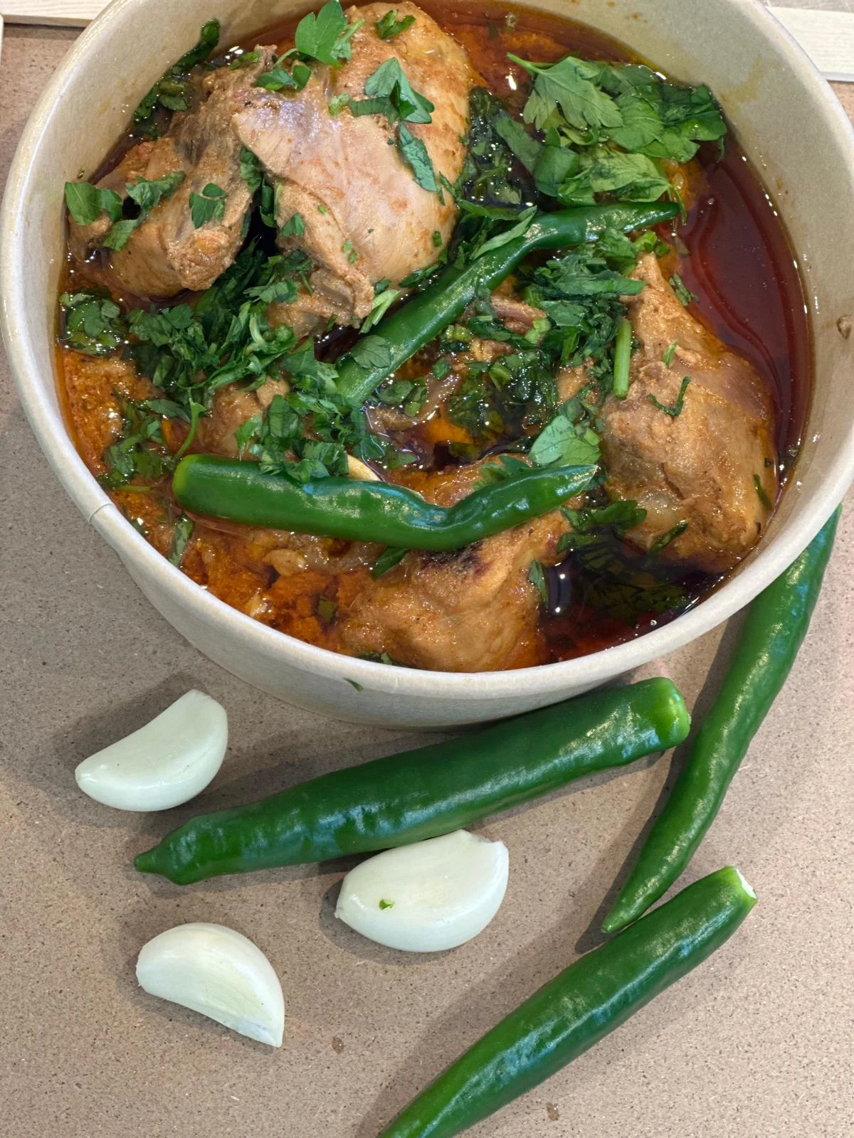 Chai Baithak chicken curry with green chillies